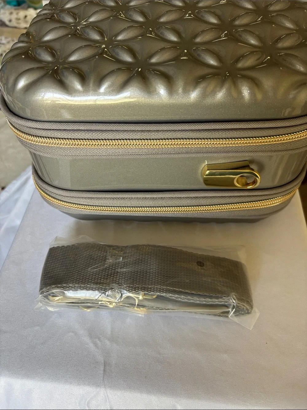 Metallic Gray Quilted Cosmetic Case with Gold Accents